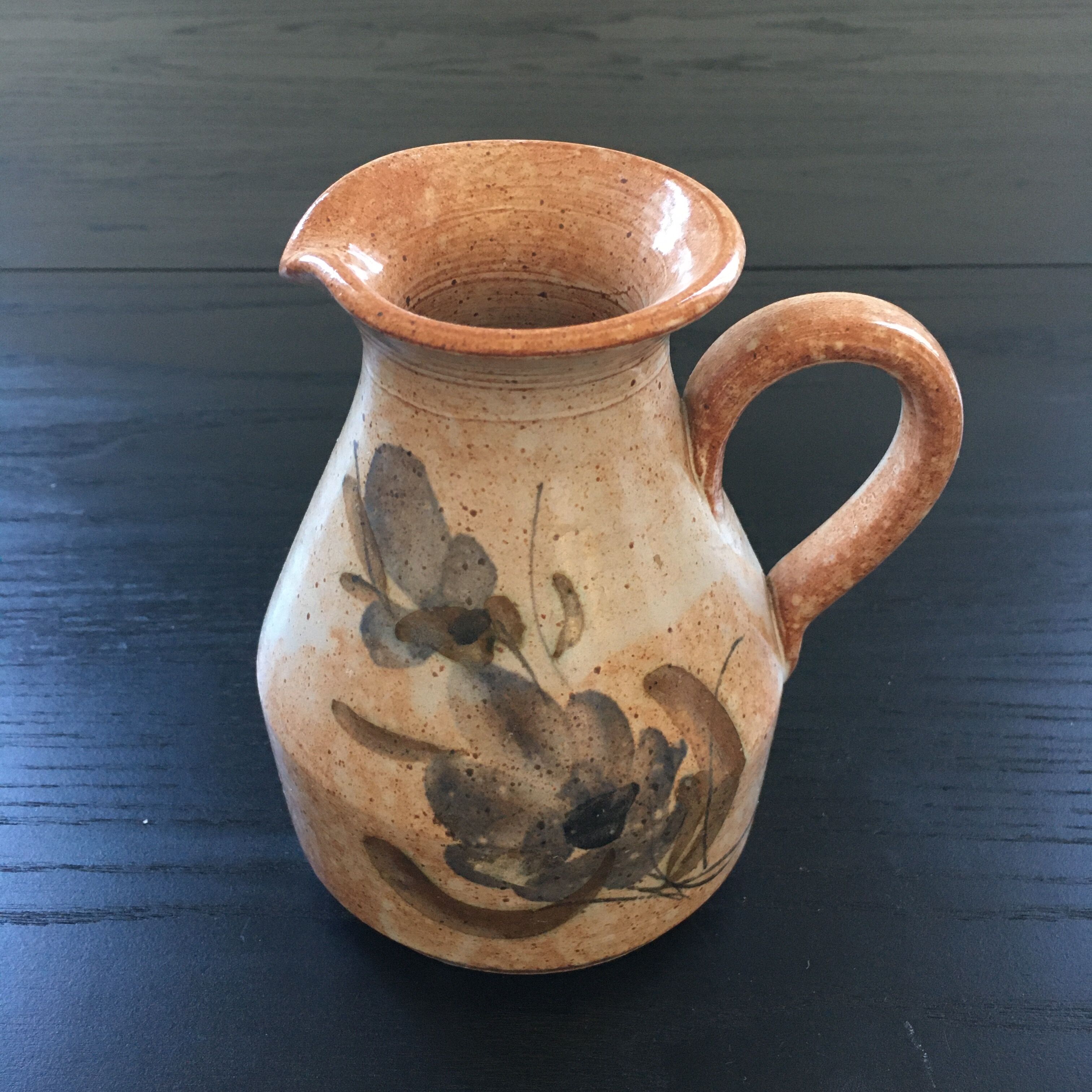 Pitcher beige floral decoration