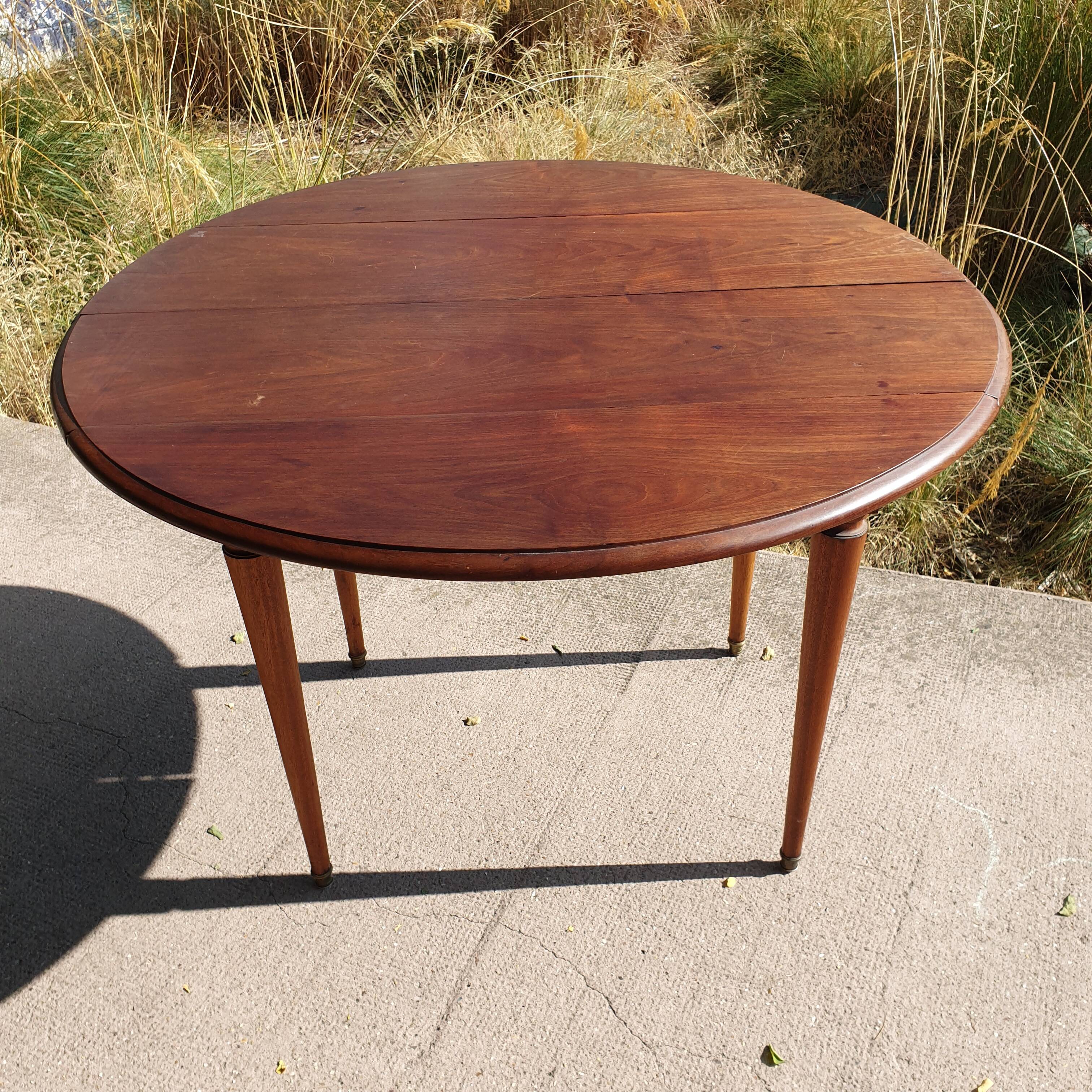 Old mahogany-shuttered round table