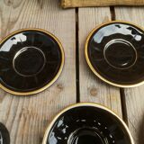 Set of 9 cups and sub-cups in black ceramic and colored gold border