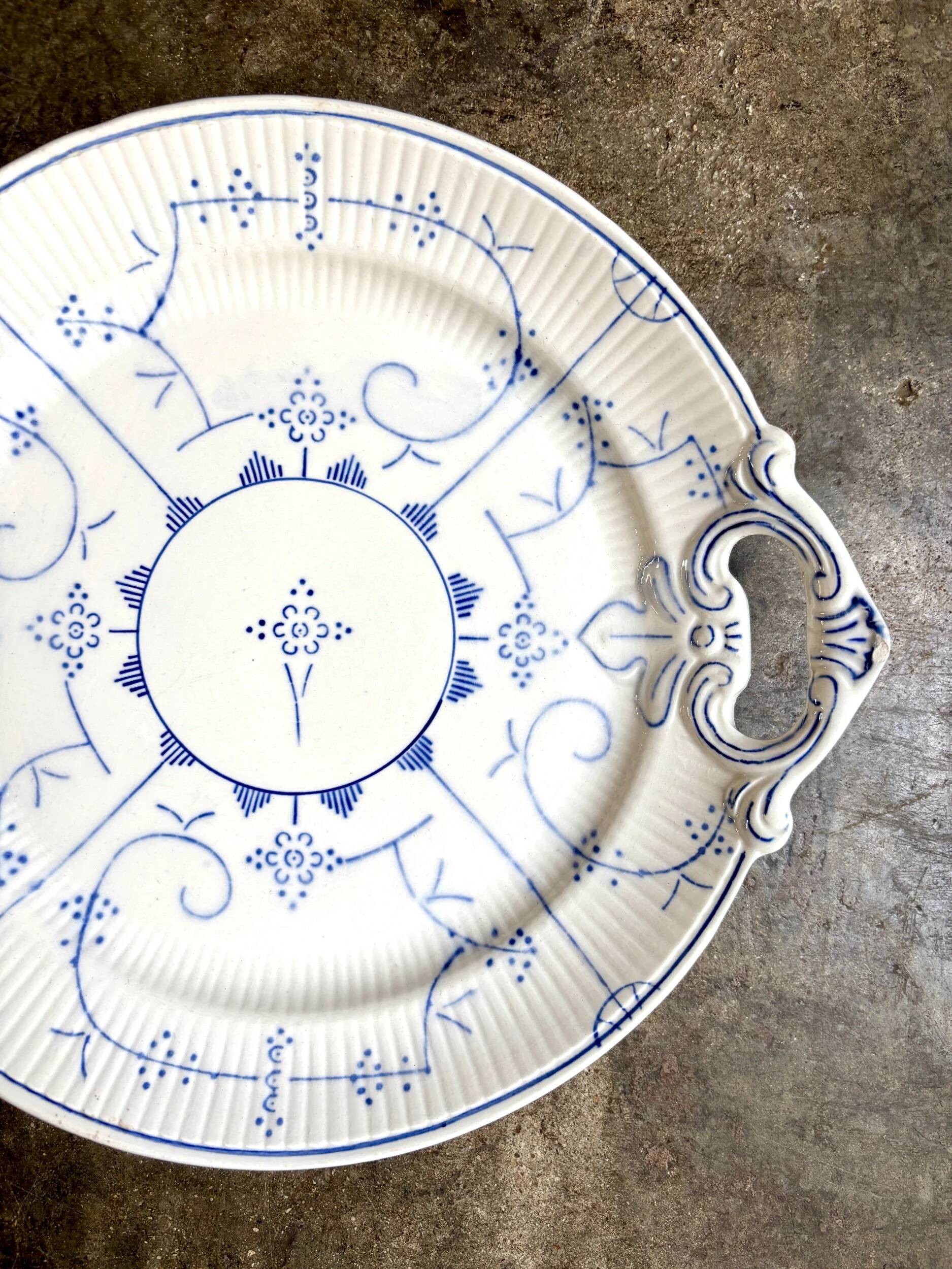 Round earthenware plate by Boch La Louvière in blue glazed earthenware, "Copenhagen" service - 1920s-30s.