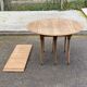 Renovated Louis Philippe round extendable dining table with leaves from the 18th century.