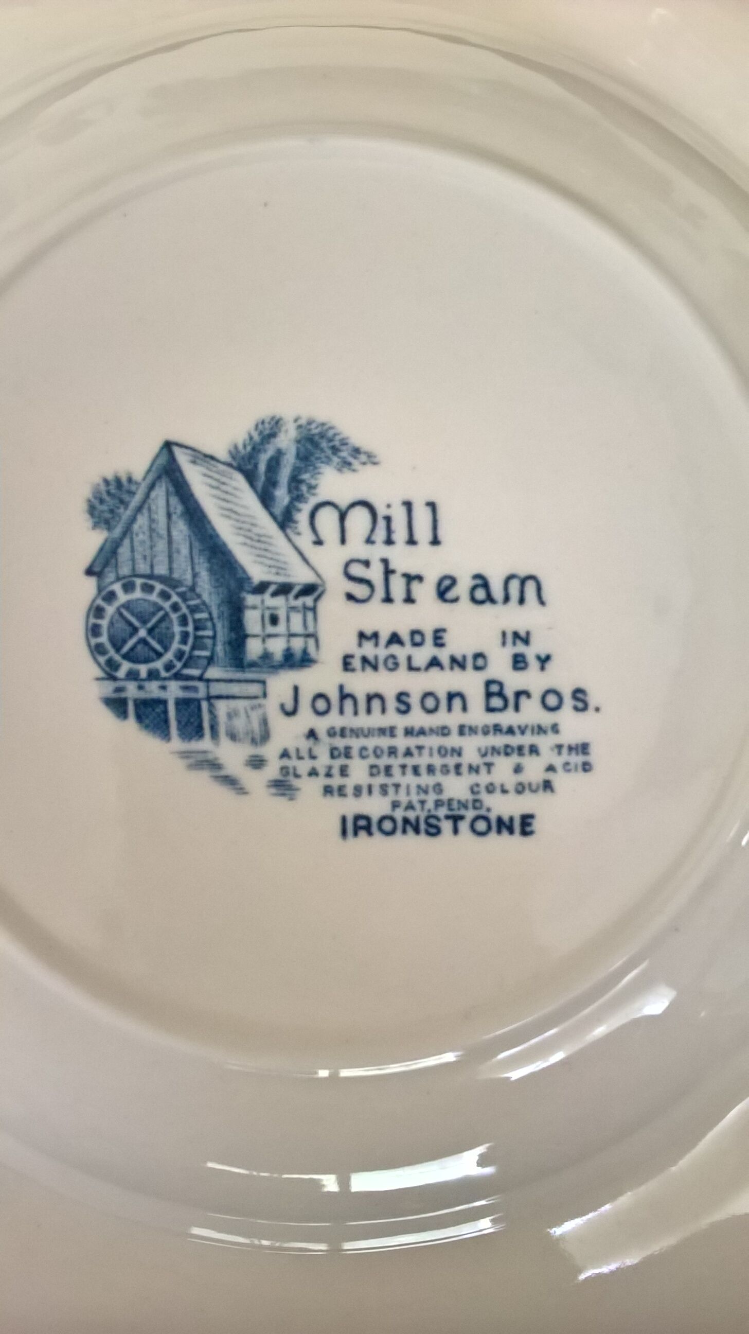 Eight English hollow plates Johnson Bros "Mill Stream"