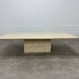 Rectangular travertine coffee table with central leg