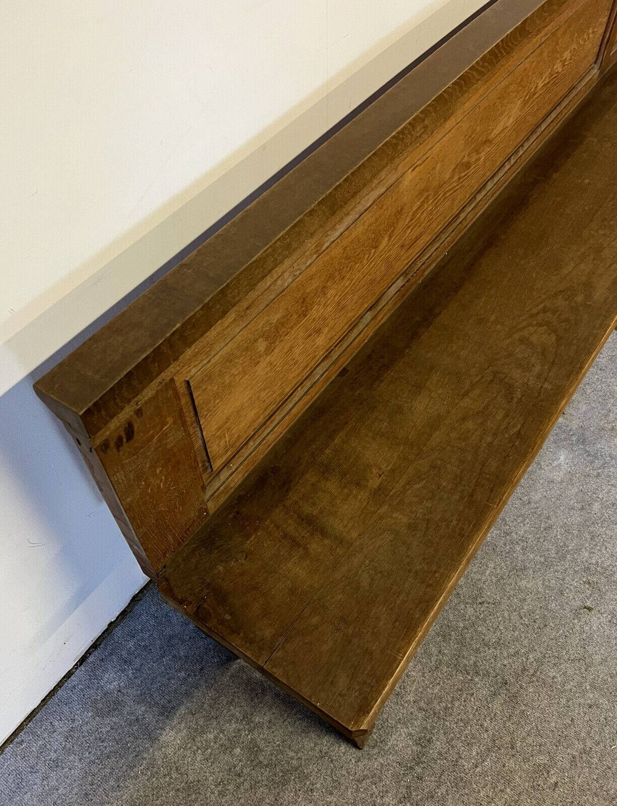 Monumental church pew with paneled backs, 19th century, circa 1880, made of oak and poplar