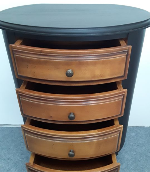 Black drum shape bedside including 4 drawers