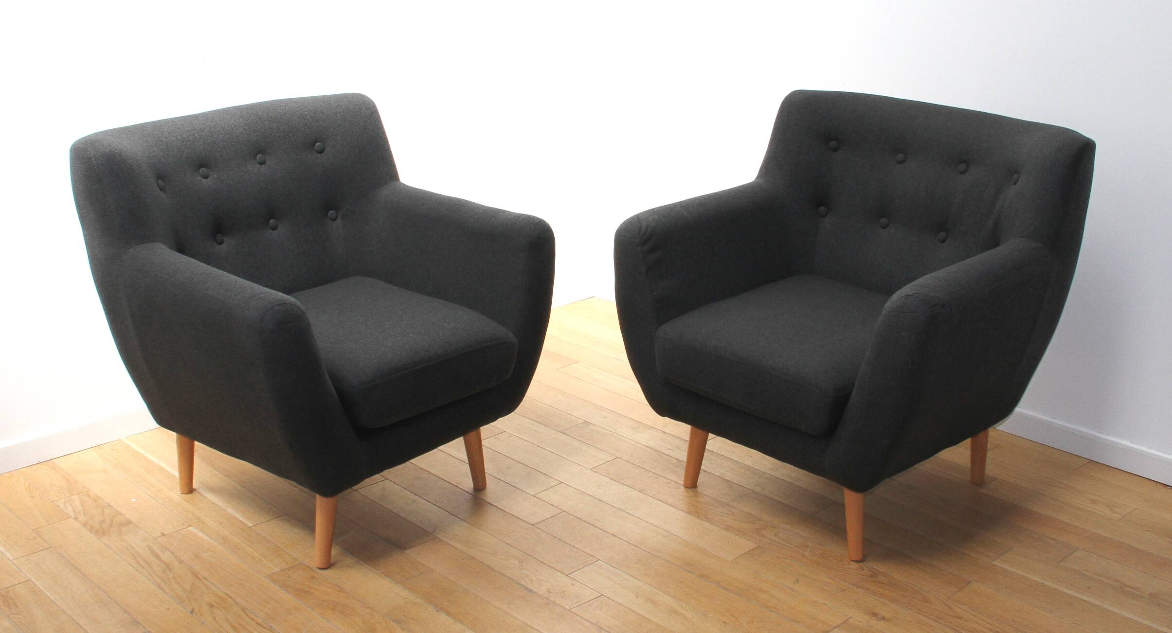 Pair of designer armchairs