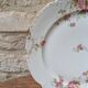 Porcelain plate with floral decoration, gilding, and relief MR France 25.5cm