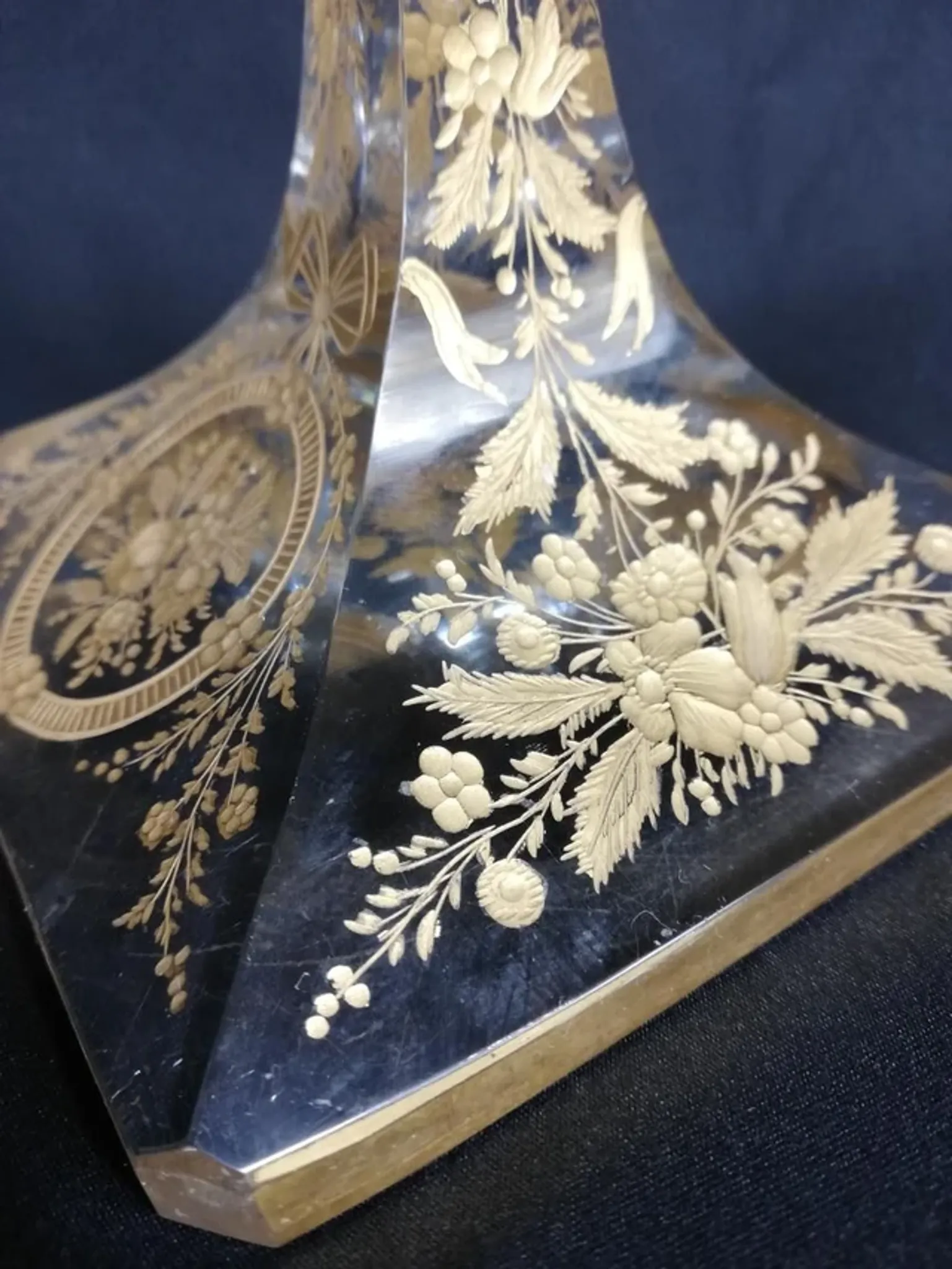 Antique glass candle holder, engraved and gilded.