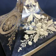Antique glass candle holder, engraved and gilded.