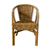 Rattan armchair with armrests