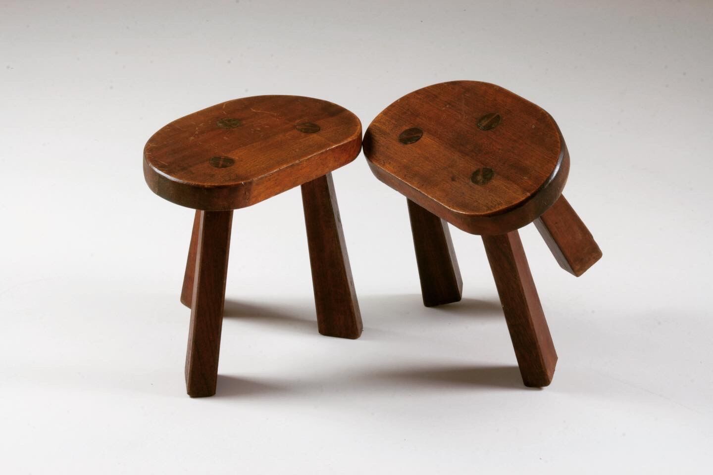 Pair of tripod brutalist stools, France 1950s