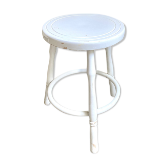 White wooden tripod stool