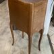 A bedside table with a drawer and a niche in Louis XV style.