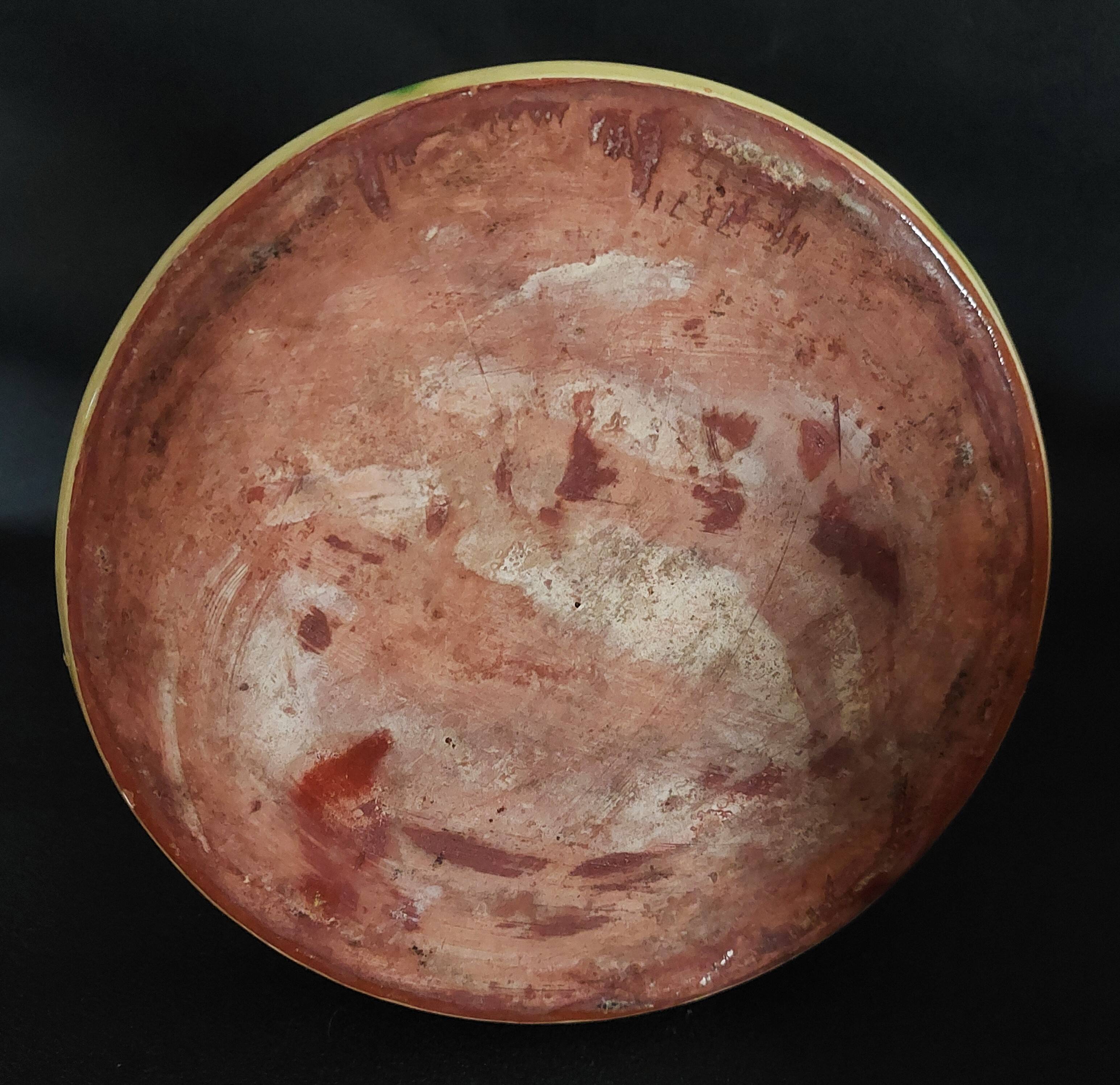 Vintage glazed terracotta ceramic jug from the 20th century.