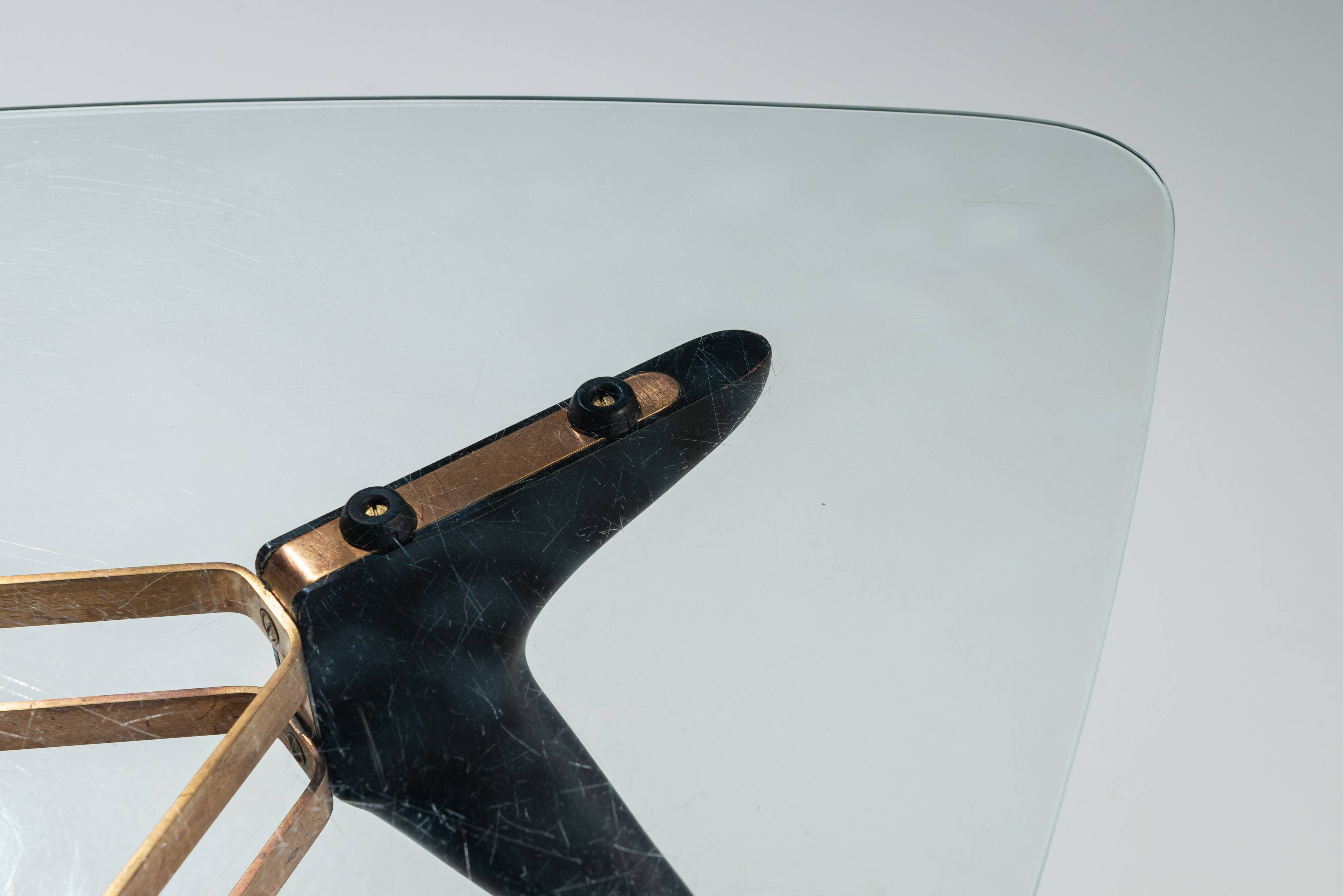 Triangular coffee table in the manner of Alfred Hendrickx