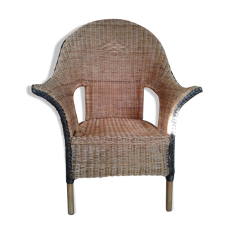 Braided rattan armchair