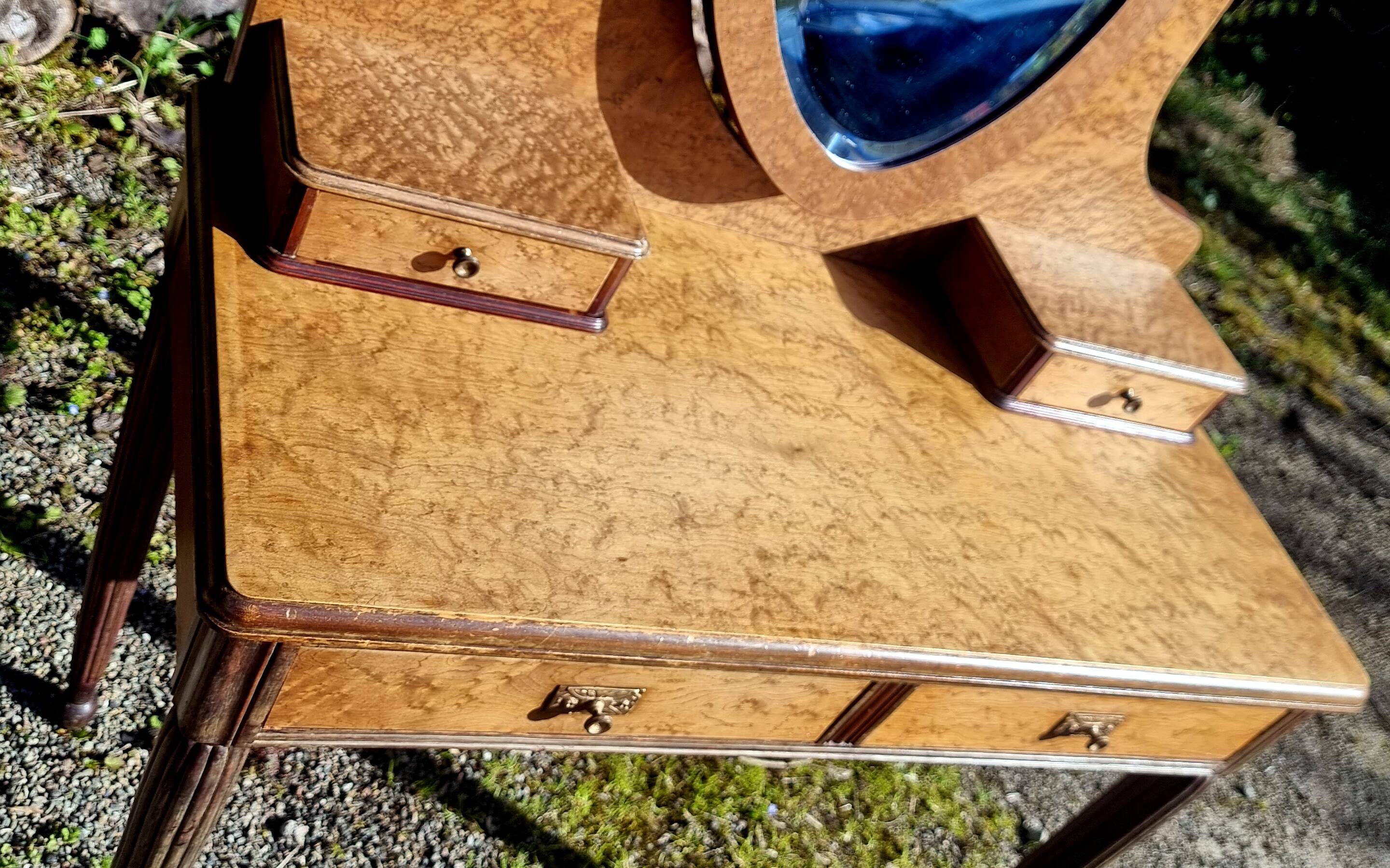 Dresser from the early 19th century with a cheval mirror.