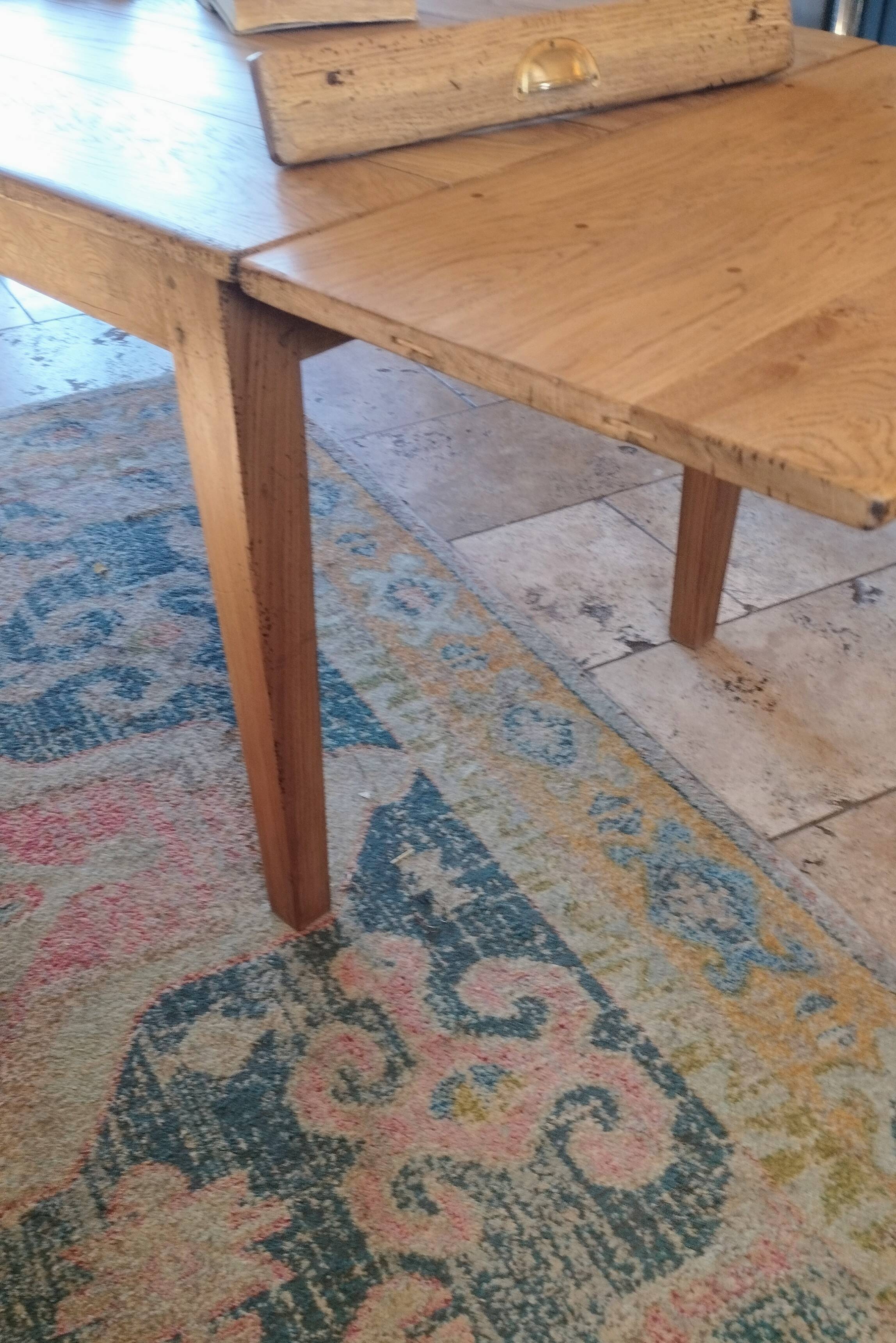 Solid oak farmhouse table with central drawer and extension