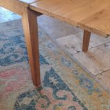 Solid oak farmhouse table with central drawer and extension