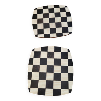 2 black and white checkerboard trivets