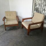 Paire de fauteuils massifs et brutalistes en teck