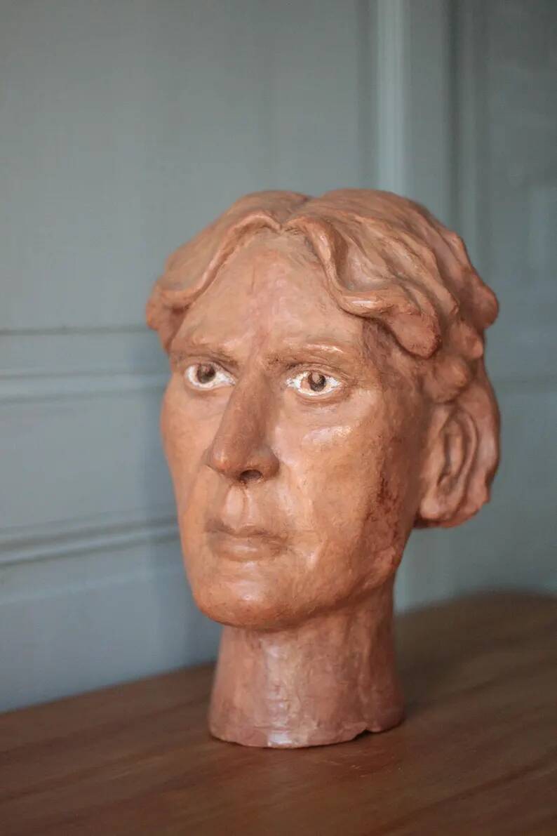 Sculpture signed Doloire, terracotta sculpture, sculpture of a man's head, collection, interior decoration.