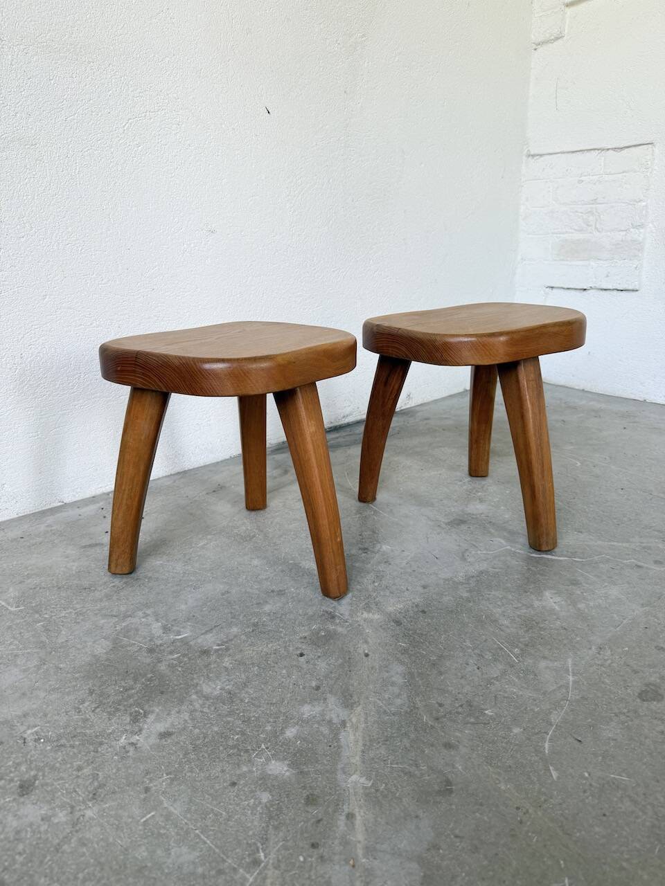 Pair of Henri Bataille oak stools