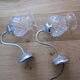 Pair of wall brackets in chromed metal and cut glass