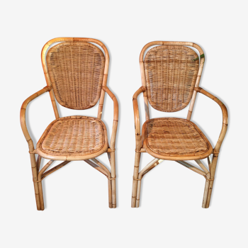 Lot de deux fauteuils en rotin clair