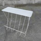 Vintage magazine holder in perforated metal