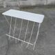 Vintage magazine holder in perforated metal