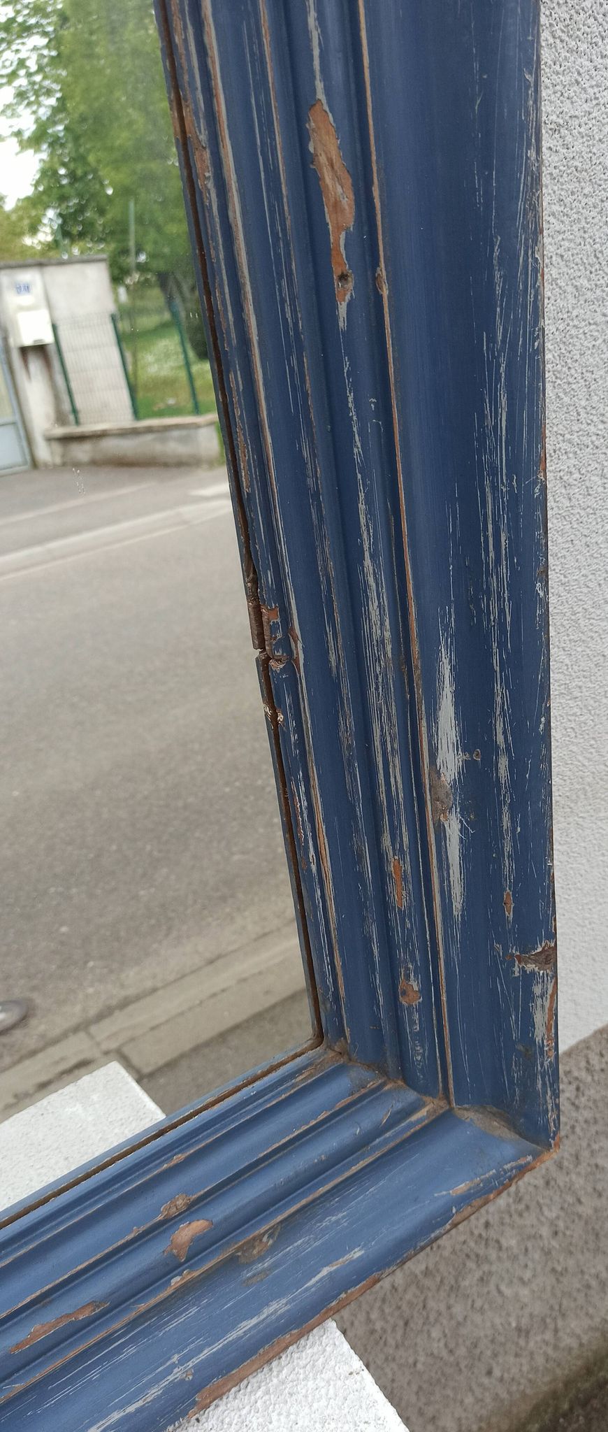 Old blue wooden mirror
