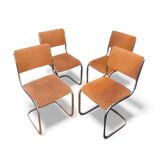 Set of 4 vintage sled chairs from the 1970s