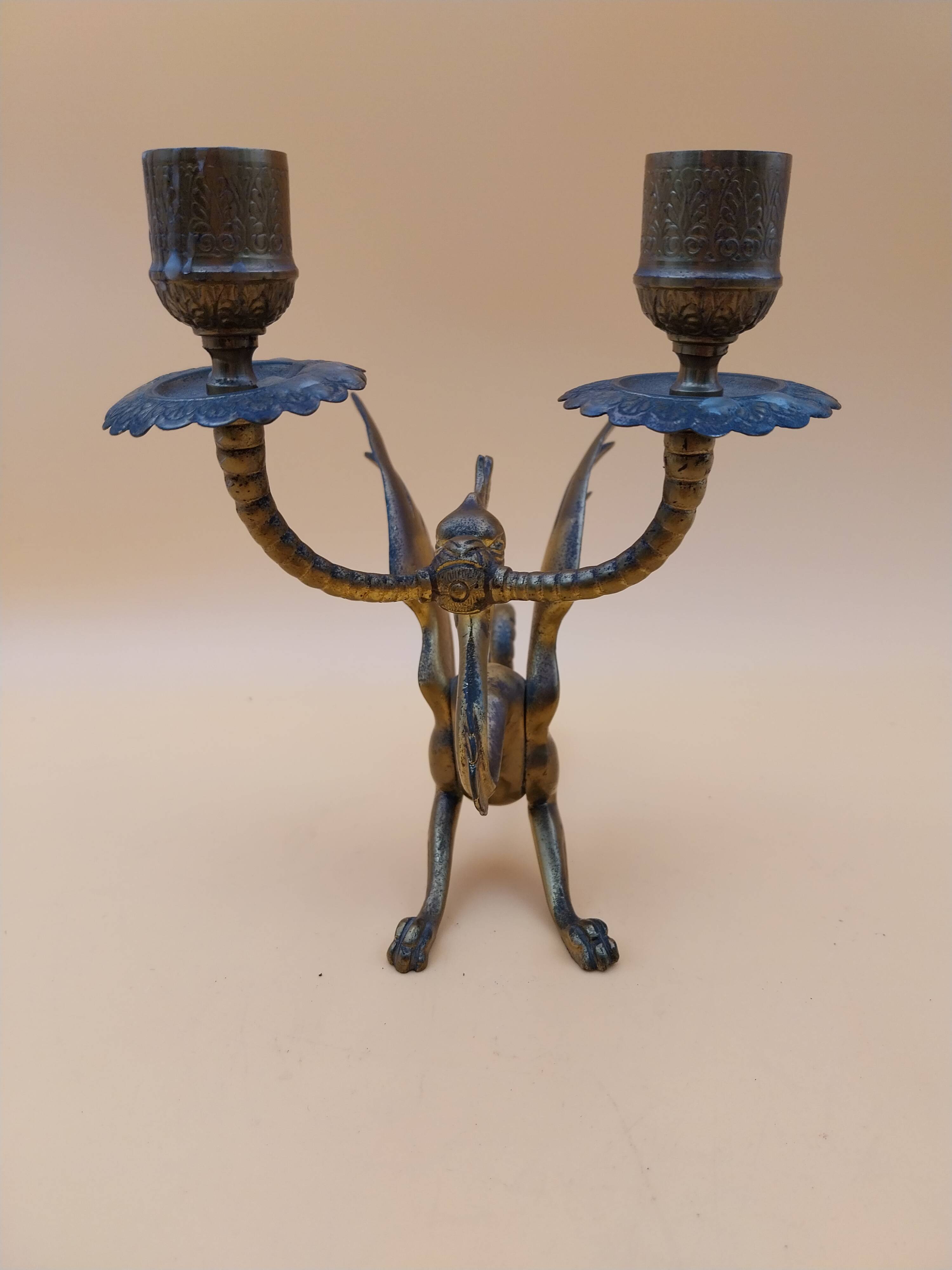 Pair of bronze candlesticks with chimera dragons