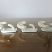 Luigi Caramella's series of 3 patères for " Con & Con " Itay era Memphis 80s