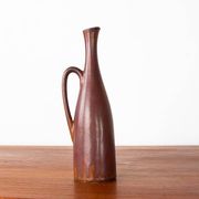 Brown glazed ceramic vase by Gunnar Nylund for Rörstrand.