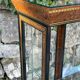 Pair of display cases in magnifying glass and black & gold lacquer, 20th century period