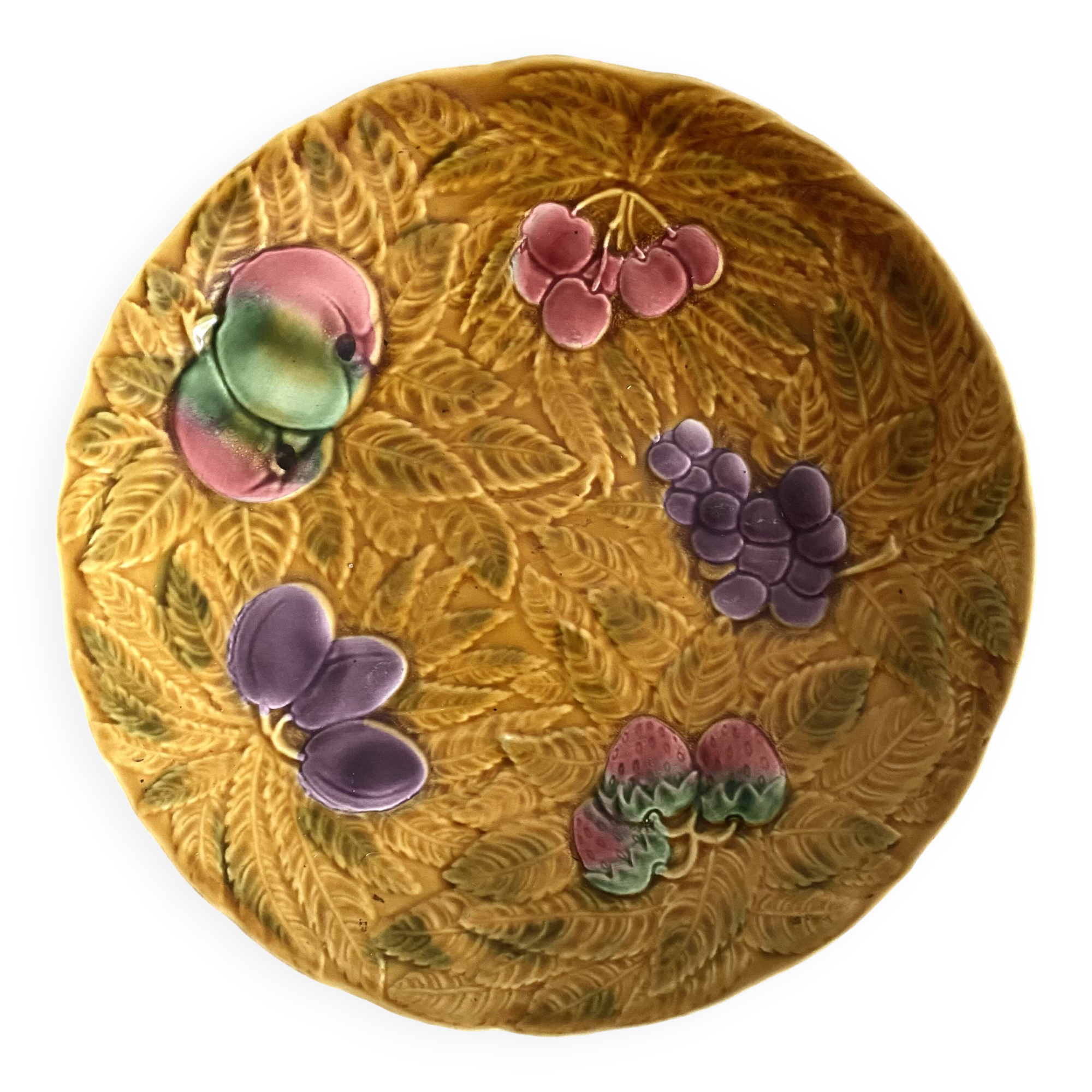 Large round Sarreguemines slip dish with fruit decoration