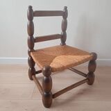 Child's chair in the style of Charles Dudouyt.