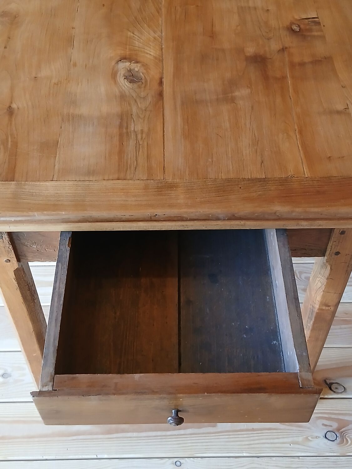 Elm farmhouse table with extensions for 6 to 10 people.