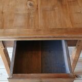 Elm farmhouse table with extensions for 6 to 10 people.