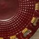 Burgundy and gold openwork plate in ceramic from Saint-Clement, 1950s.