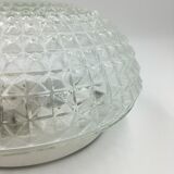 Ceiling lamp in molded glass in relief