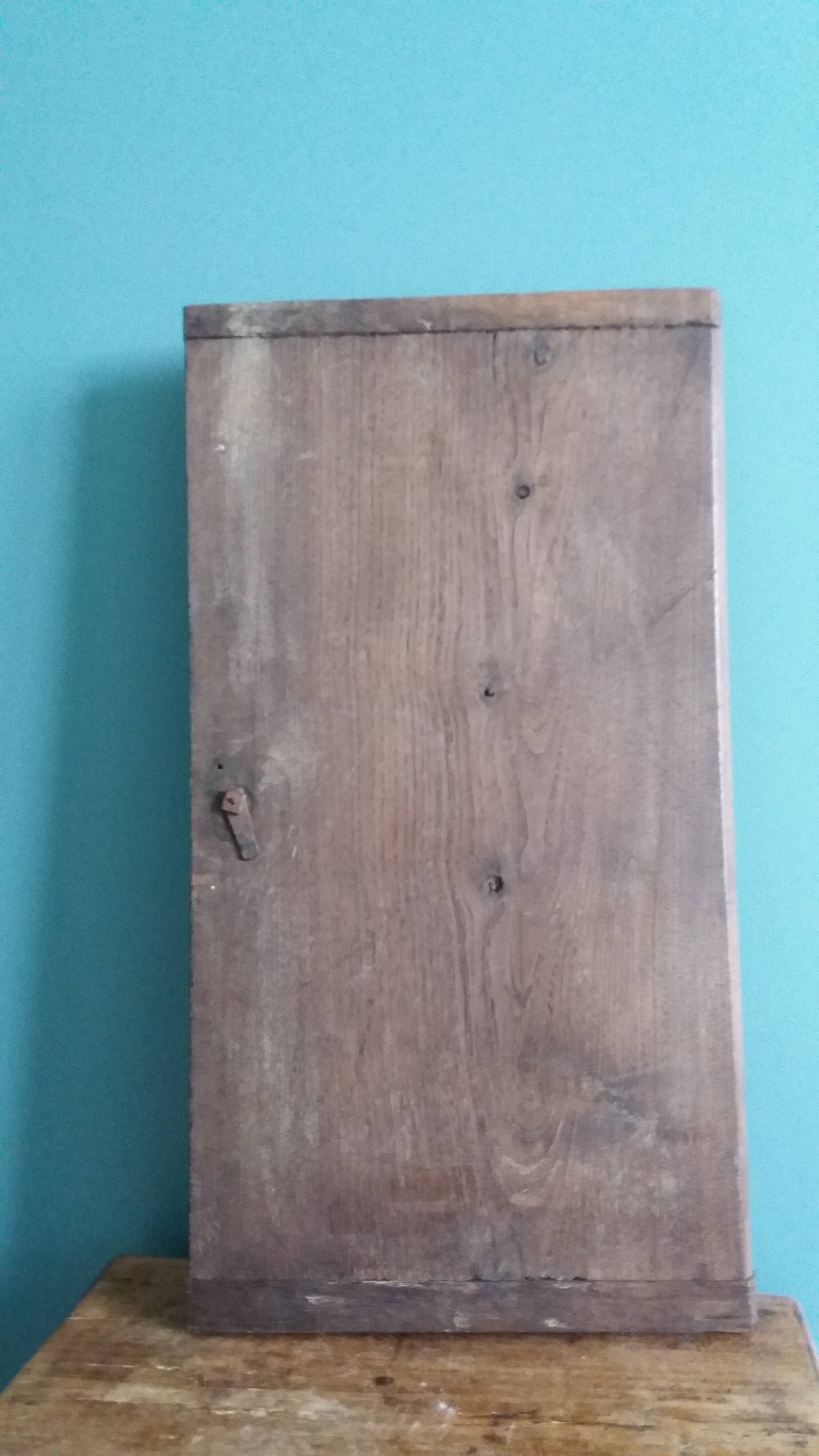 Old door with a bronze handle