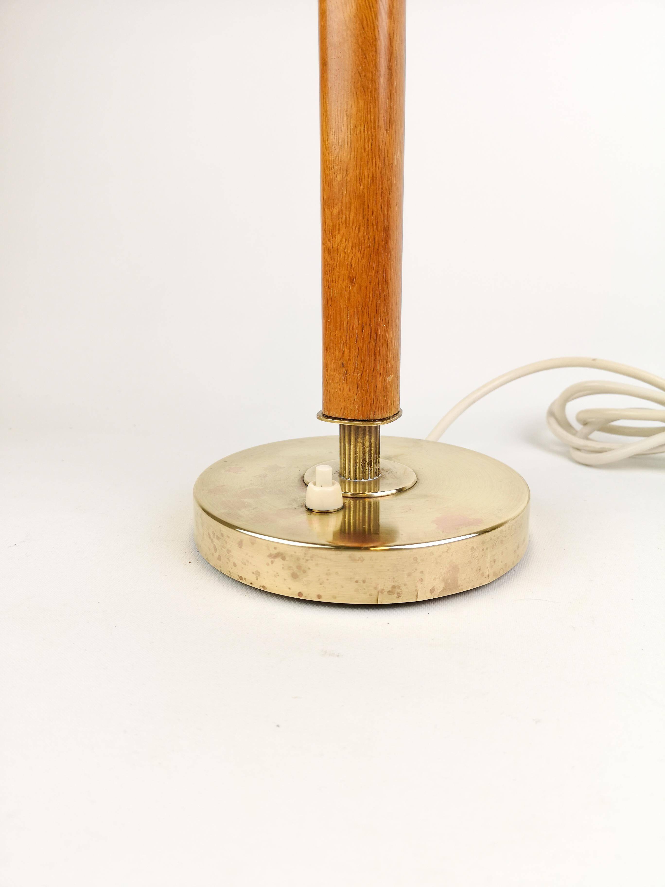 Mid-century Swedish table lamp in brass, crystal, and wood by Boréns.