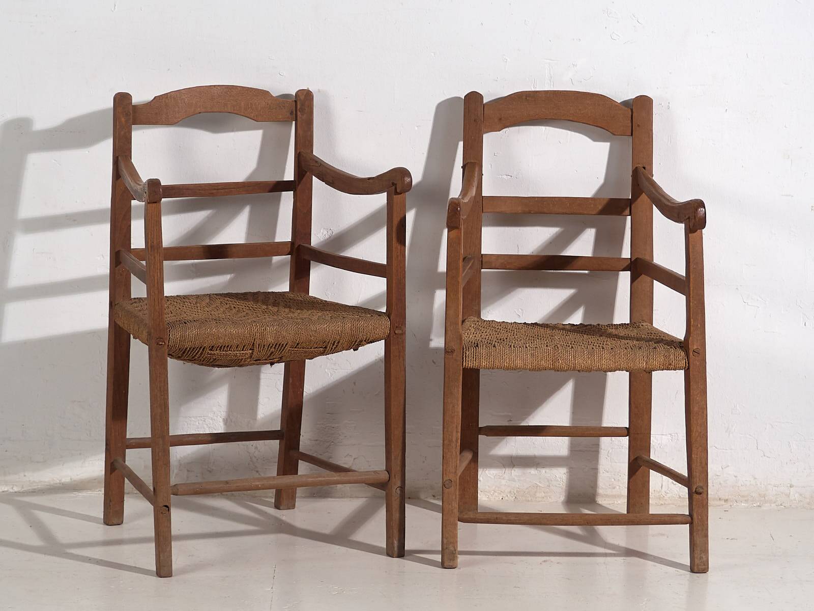 Two oak and rope armchairs, circa 1900