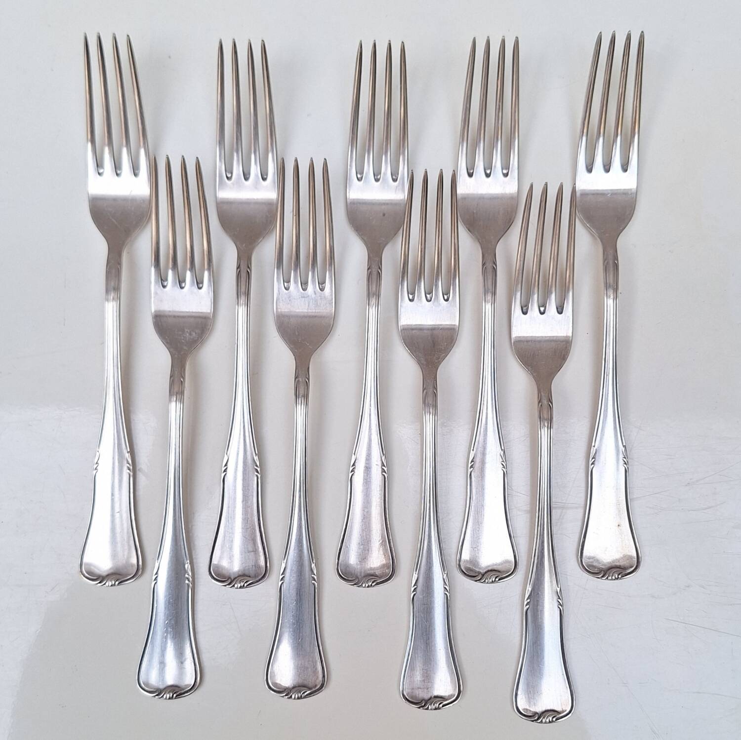 Set of small silver-plated metal forks