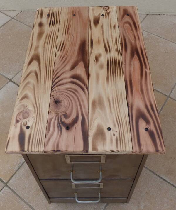 Old industrial furniture in rusty effect metal with two drawers on casters