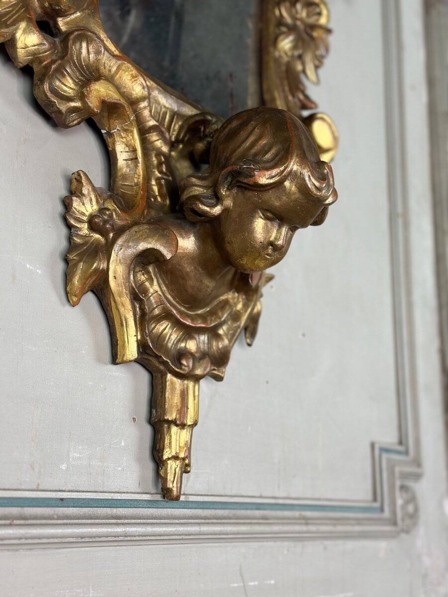 Pair of carved and gilded wooden mirrors, Italy 19th century