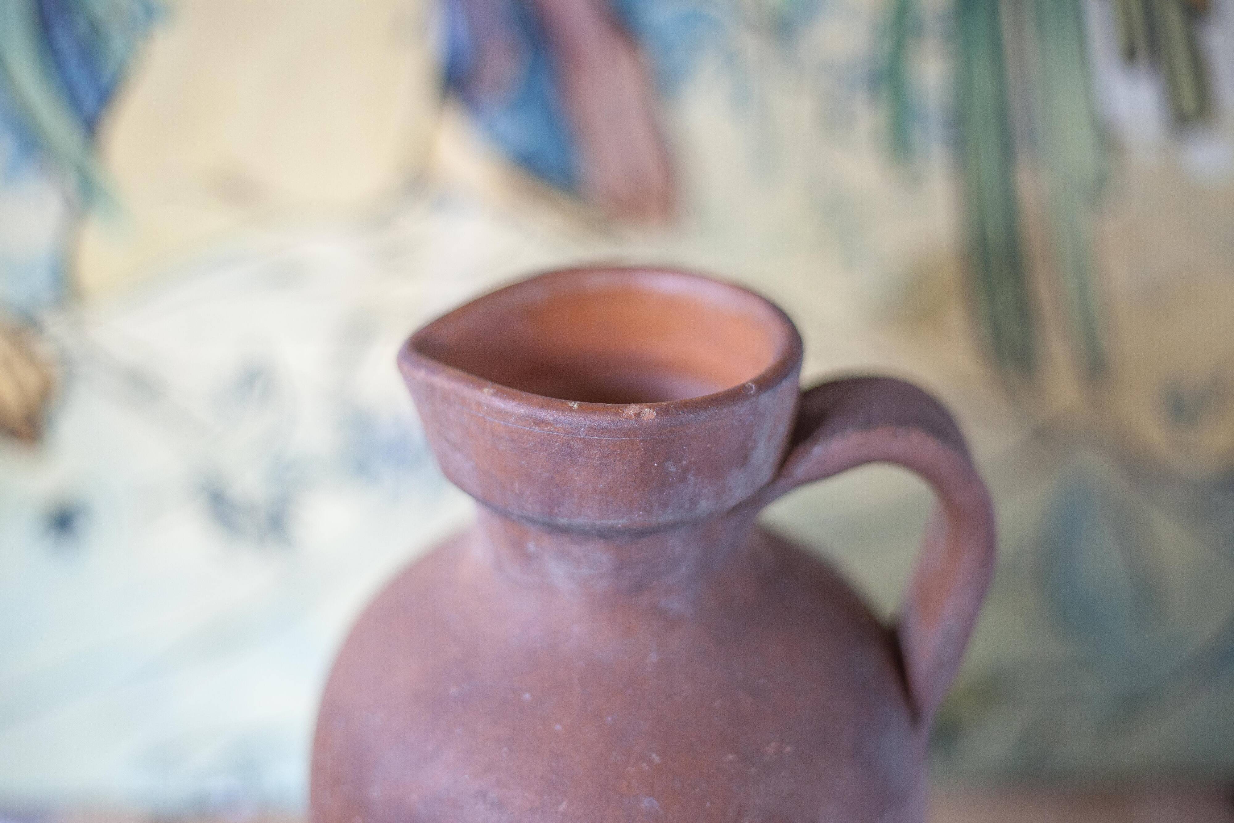 Terracotta jug with vintage handle, terracotta vase, interior decoration, primitive, pitcher